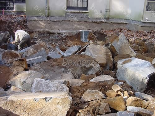 Dexpan Proyecto de excavacin y demolicin de rocas en el patio de una casa